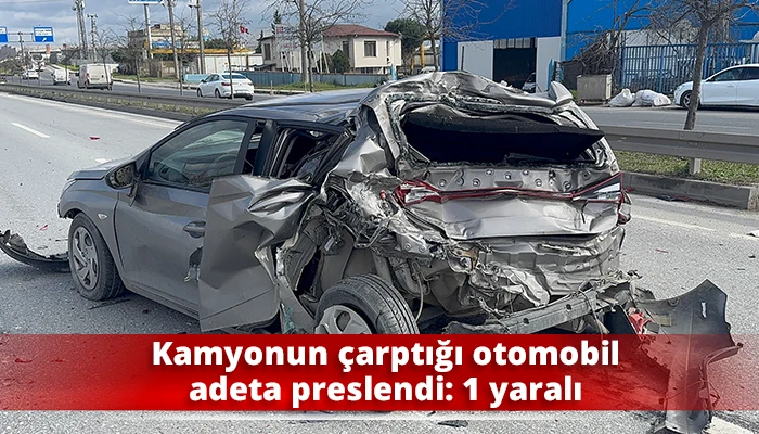 Kamyonun &ccedil;arptığı otomobil adeta preslendi: 1 yaralı