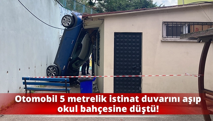 Otomobil 5 metrelik istinat duvarını aşıp okul bahçesine düştü!